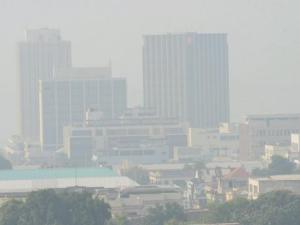The New Kingston business center in a polluted haze a few days ago. Downtown Kingston is still smothered in smoke today.  (Photo: Gleaner)
